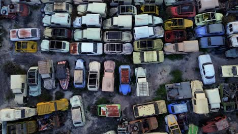 car scrapping  dismantling decommissioning aerial drone view