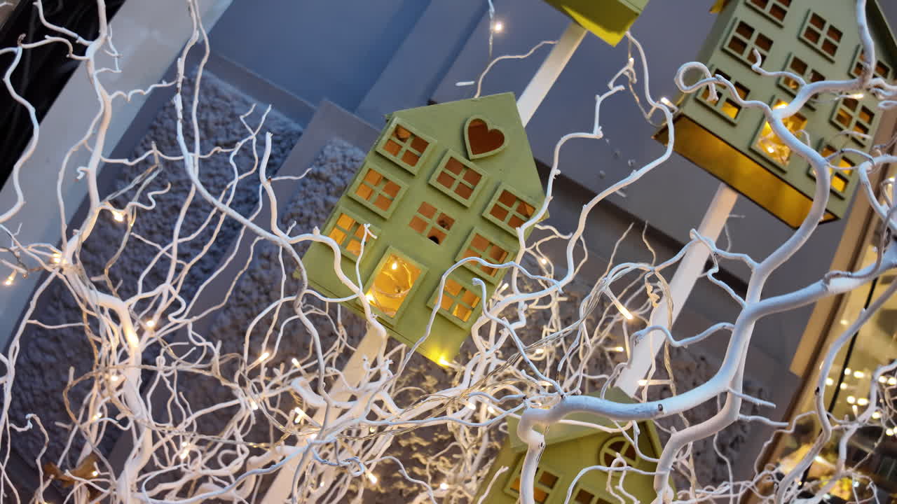 Small house with yellow lights as christmas decorations