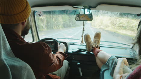 young couple traveling in van