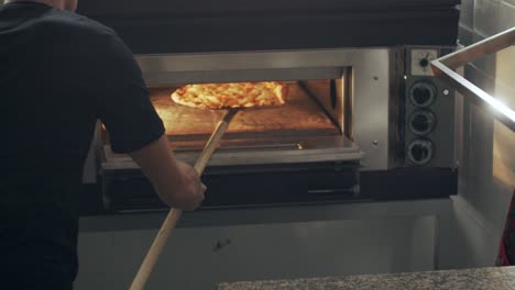 Baking-Italian-pizza-in-oven