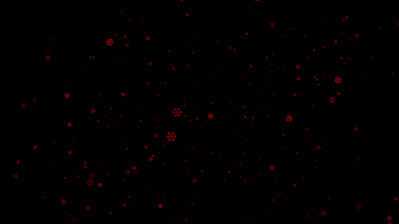 Magical overlay of red snowflakes and sparkling particles falling against isolated black background. For Christmas or Valentine's Day
