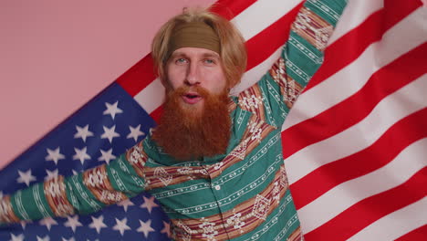 hippie redhead bearded man waving wrapping in american usa flag, celebrating, human rights, freedoms