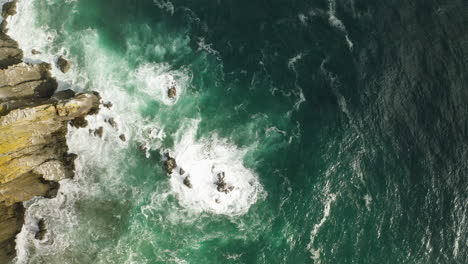 Pacific-Ocean-waves-breaking-against-cliffs-of-Oregon-Coast