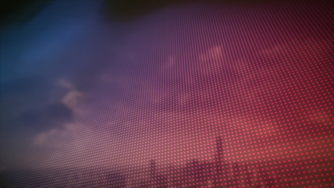 Animation of pink to blue rows of spots over cityscape in background