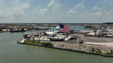 aerial point of view of waterfront restaurants and bars in rockport, texas in 4k