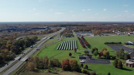 Drone-view-over-small-town-during-autumn-in-pan-motion