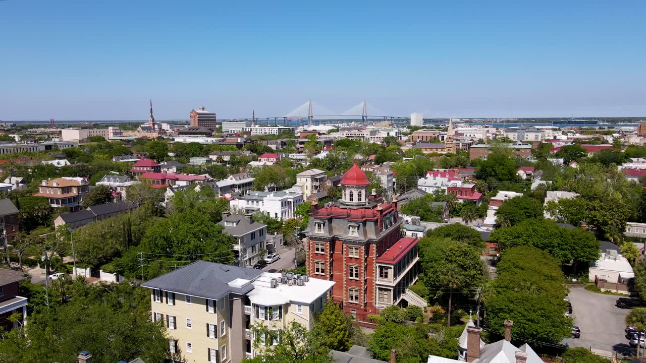 Charleston South Carolina Colonial Lake Park with Cooper River Bridge in background dolly forward shot