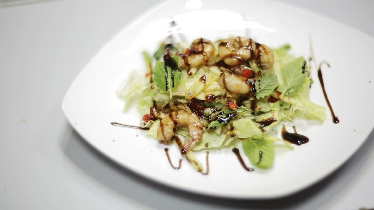 Fresh Salad With Seafood. Green salad with fresh leaves and shrimps