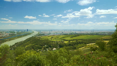 Time-lapse-of-the-city-of-Vienna,-Austria-on-a-sunny-day-with-moving-clouds---shot-in-July-2022