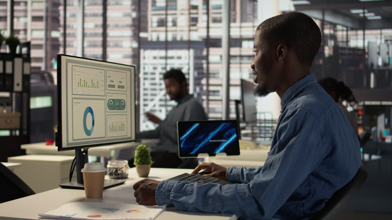 Business Person Working on Computer in Modern Office