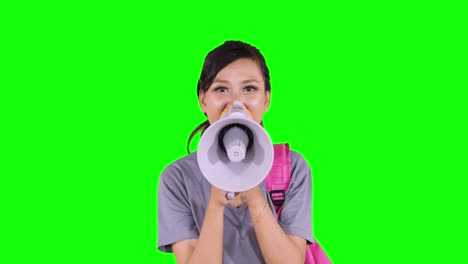 female college student talking with megaphone