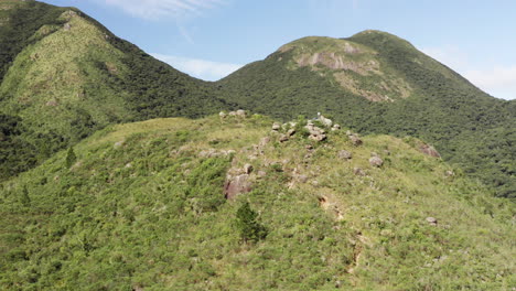 Aerial-approachig-a-hiker-on-the-summit-of-a-brazilian-amazon-rainforest-tropical-mountain,-Brazil,-South-America