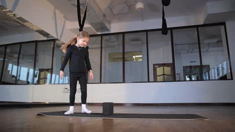 young girl practicing yoga