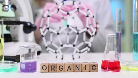 organic chemistry lab setup with molecular model and equipment