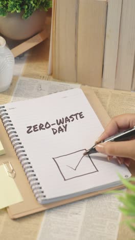 vertical video of ticking off zero-waste day from checklist