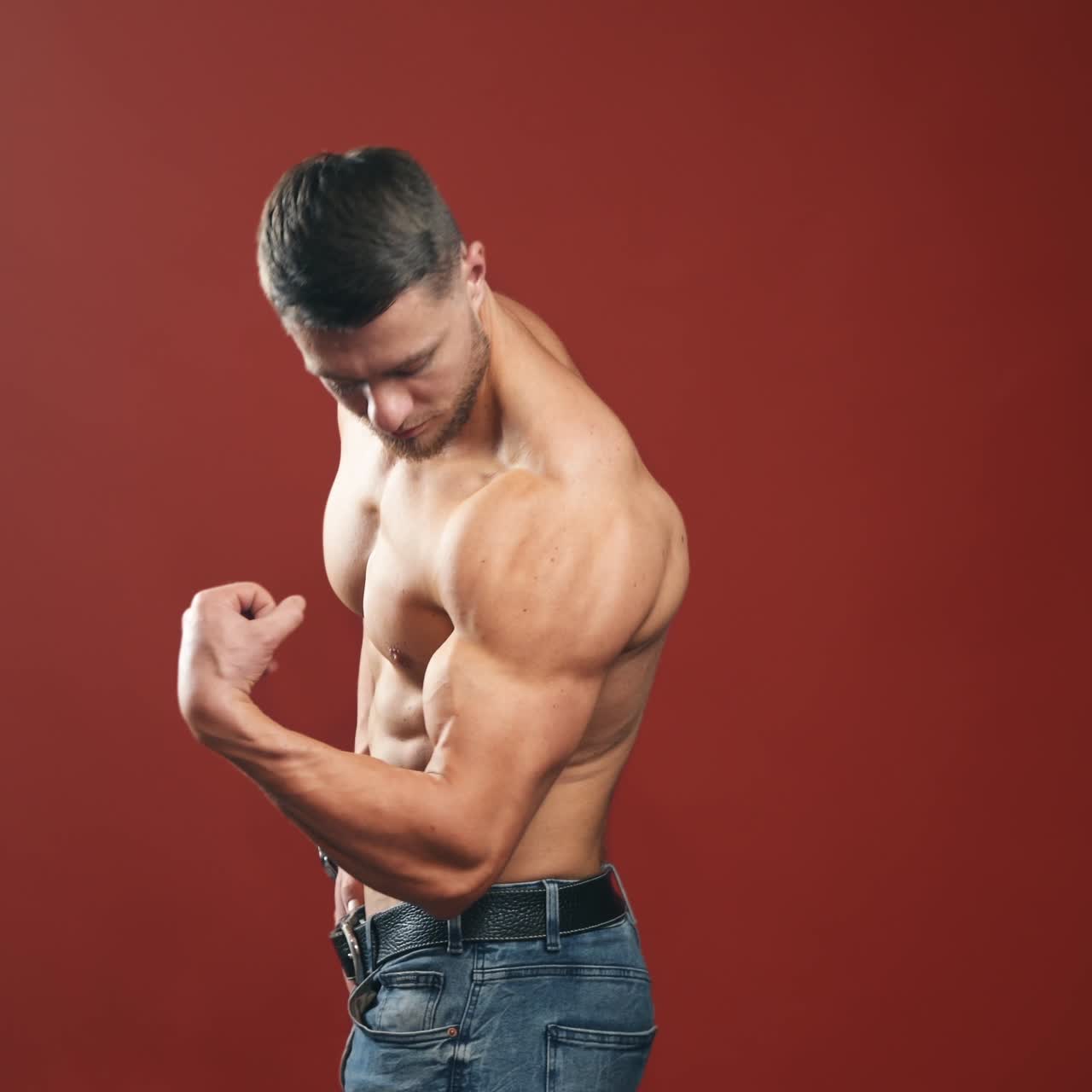 Handsome muscular man posing