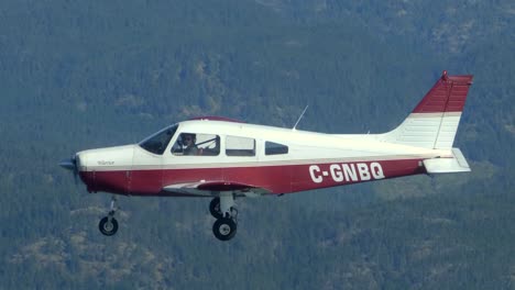 private propeller airplane flying in formation, side view