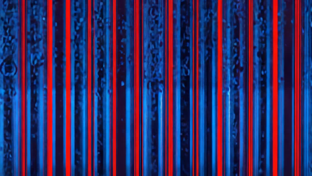 Forming bubbles at tank base rising through clear channel in studio, refracting red blue stripes