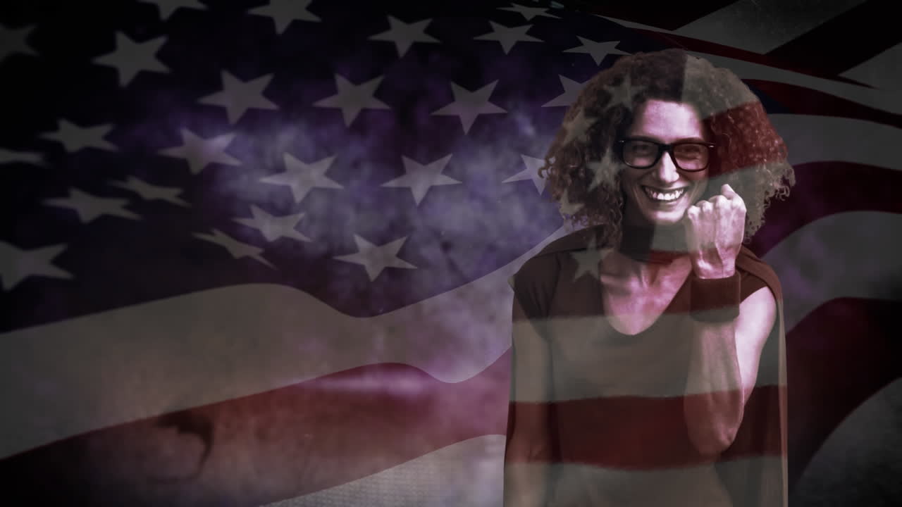 Portrait of woman dressed as superwoman smiling with American flag