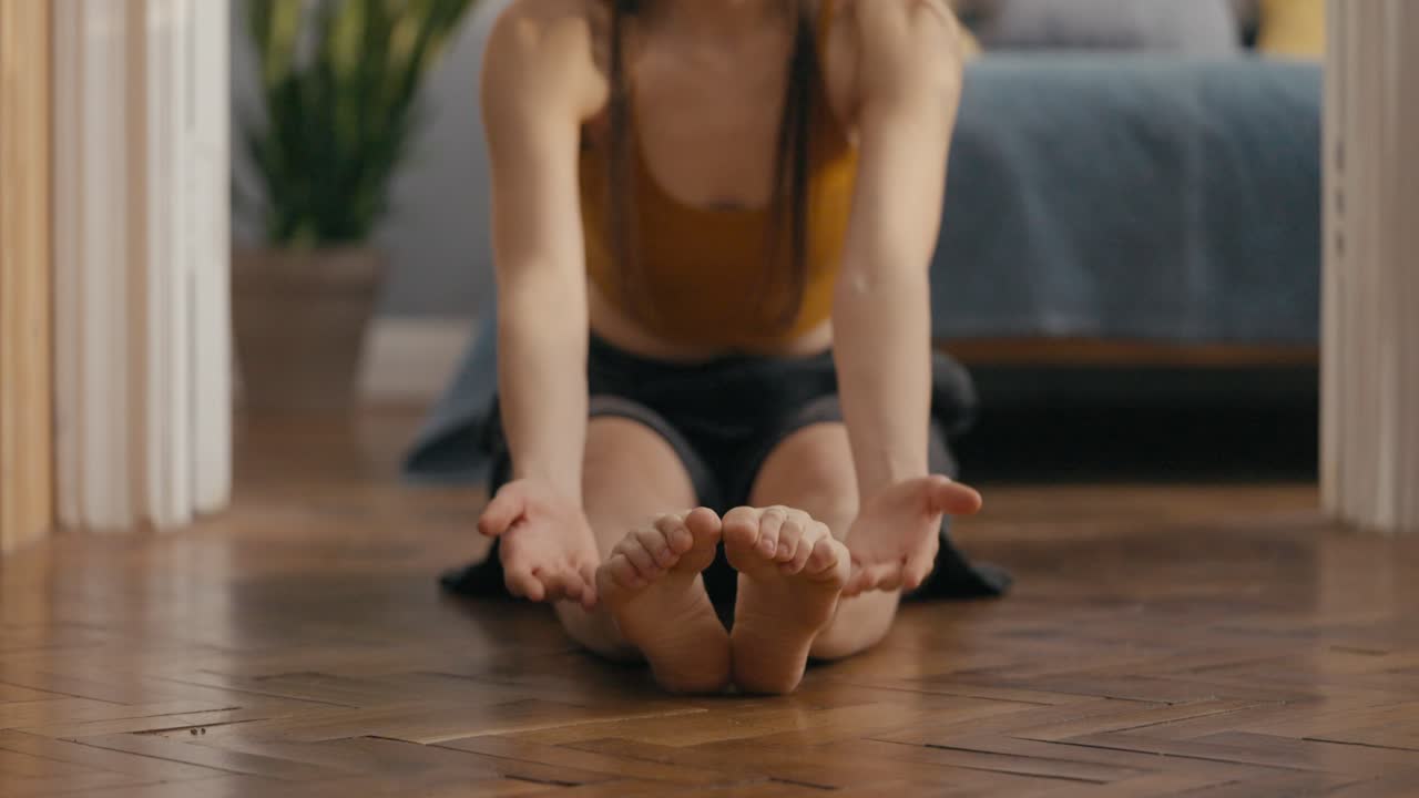 Woman Doing Yoga at Home