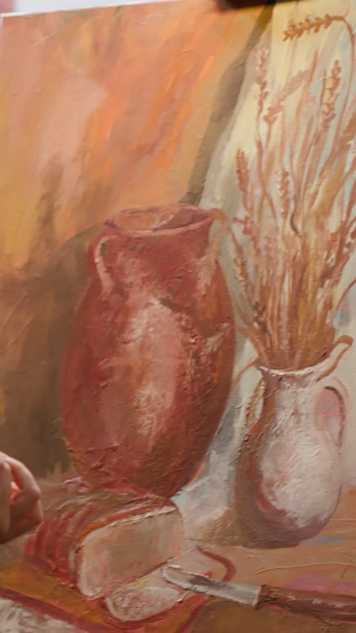 Artist's Hand Painting a Still Life with Oil Paints on Canvas