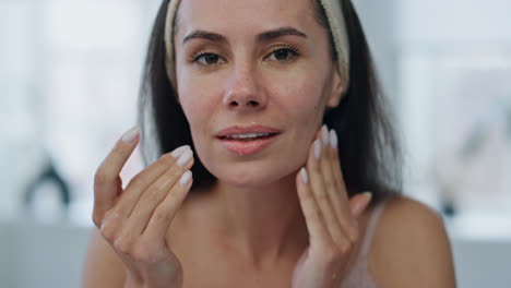 Closeup-model-washing-skin-with-water-home.-Portrait-smiling-girl-cleaning-face