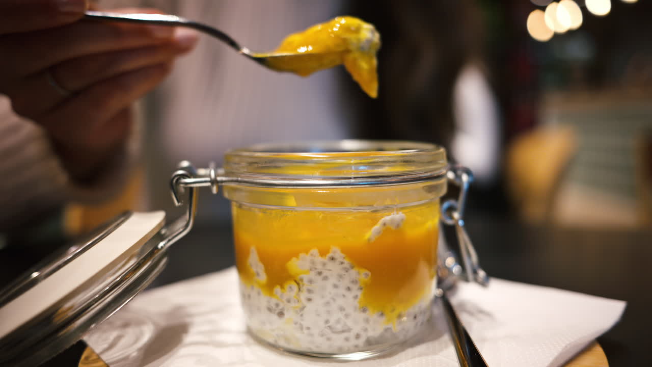 Coconut mango chia pudding in a glass jar