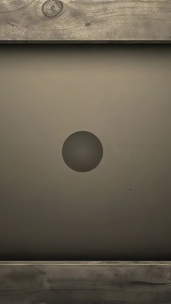 Vertical video: Zooming camera showing grey sphere filling view between trims, revealing surface