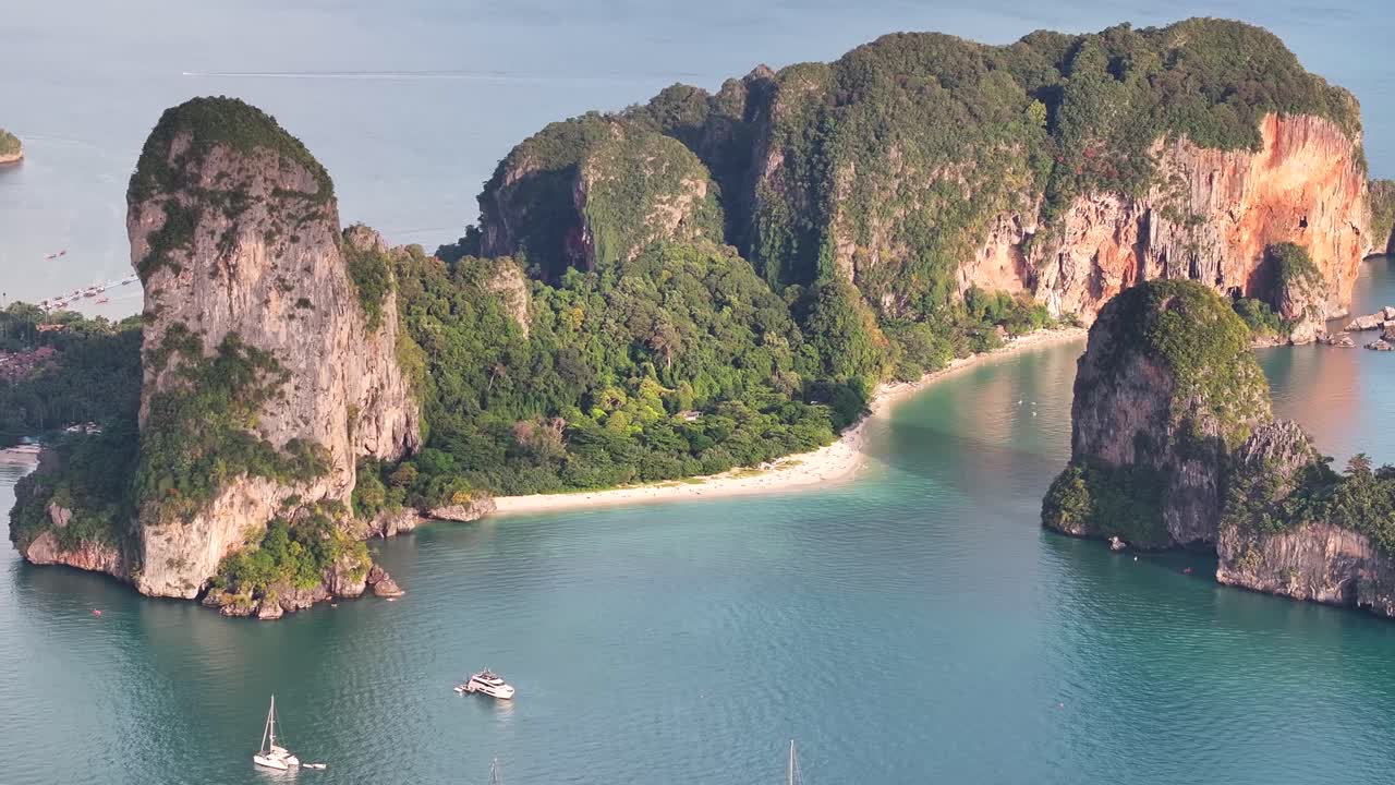 Beautiful view of Phra Nang sandy beach surrounded by cliffs at Krabi, Thailand. Drone