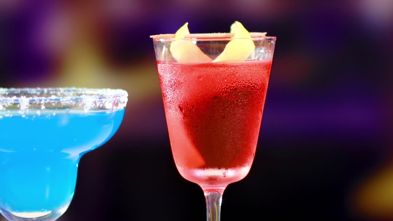 Two cocktails at a bar