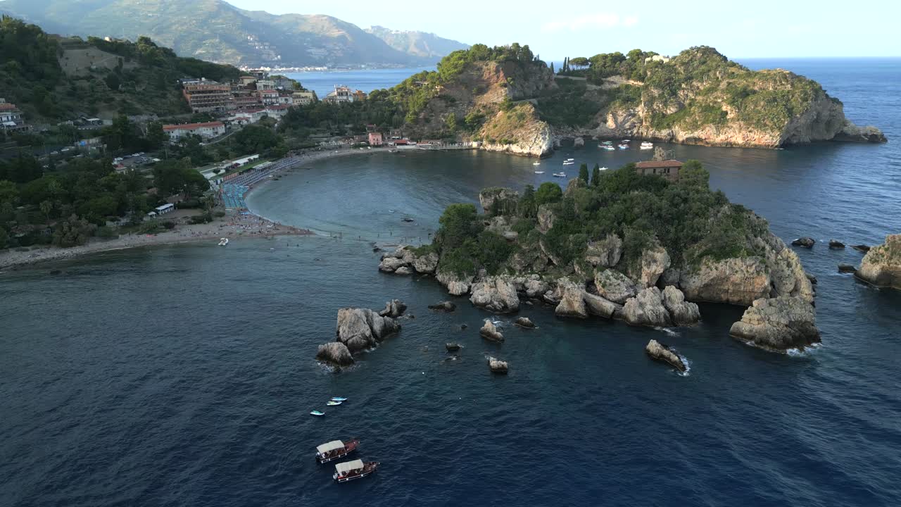 4K Aerial of Isola Bella at Sunset, in Taormina, Sicily in July 2025