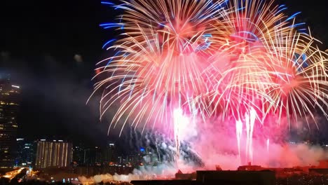 colorful fireworks over a city at night