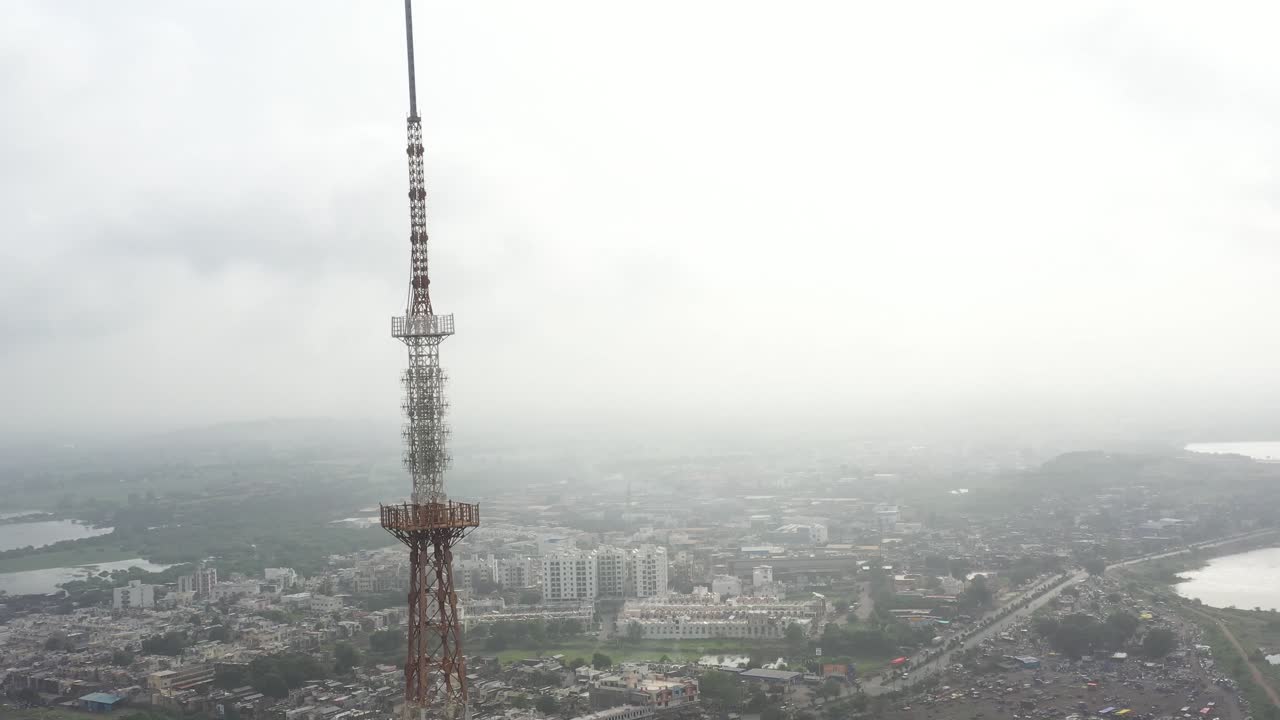 worker picking a metal rod