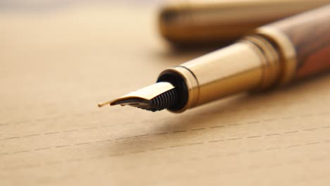 close-up of a gold fountain pen nib