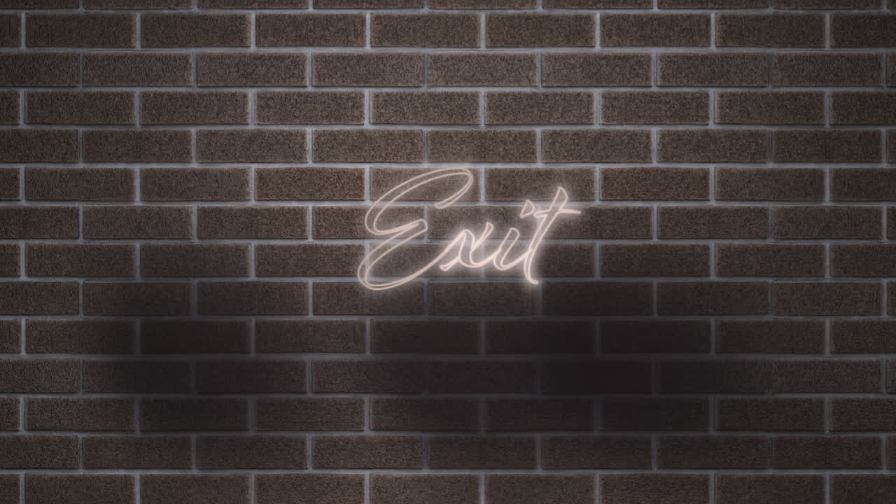 Neon glowing exit text against brick wall in background