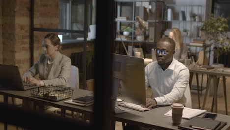 employees working on computer in the office