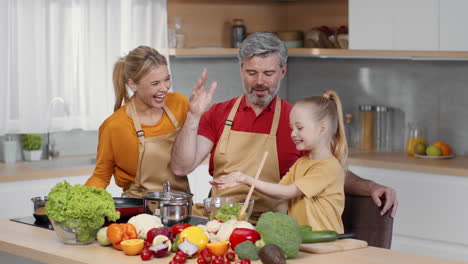 happy family cooking together
