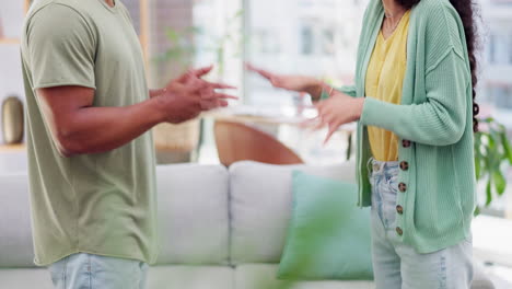 Fight,-hands-and-couple-in-a-living-room