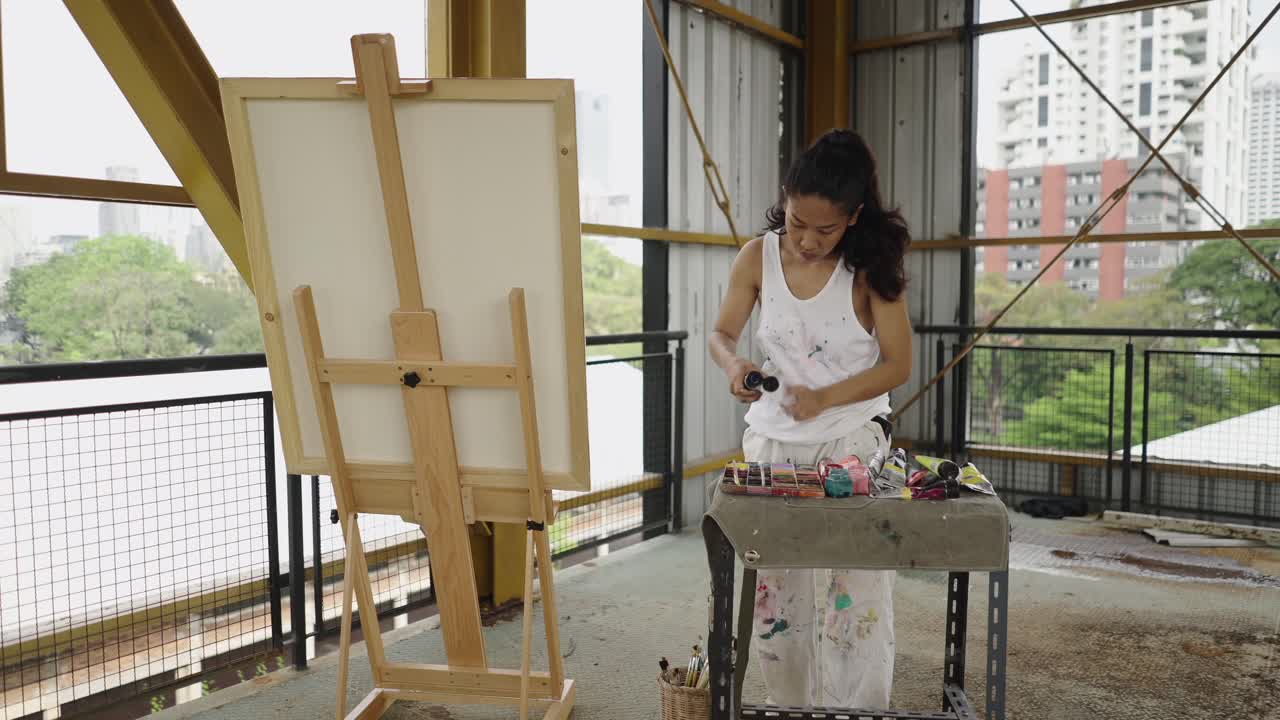 Artist preparing to paint outdoors