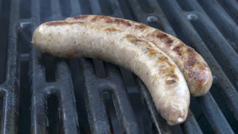 preparing tasty german sausages on a bbq grill, barbeque, germany