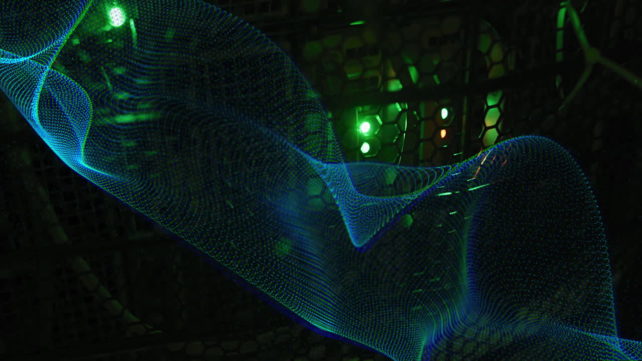 Animation of blue network wave moving over dark computer servers