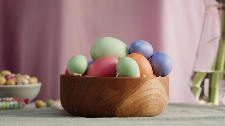 Happy Easter holiday. Colored eggs close-up. Preparing for Easter, painting and decorating eggs. Christian celebration, family traditions.