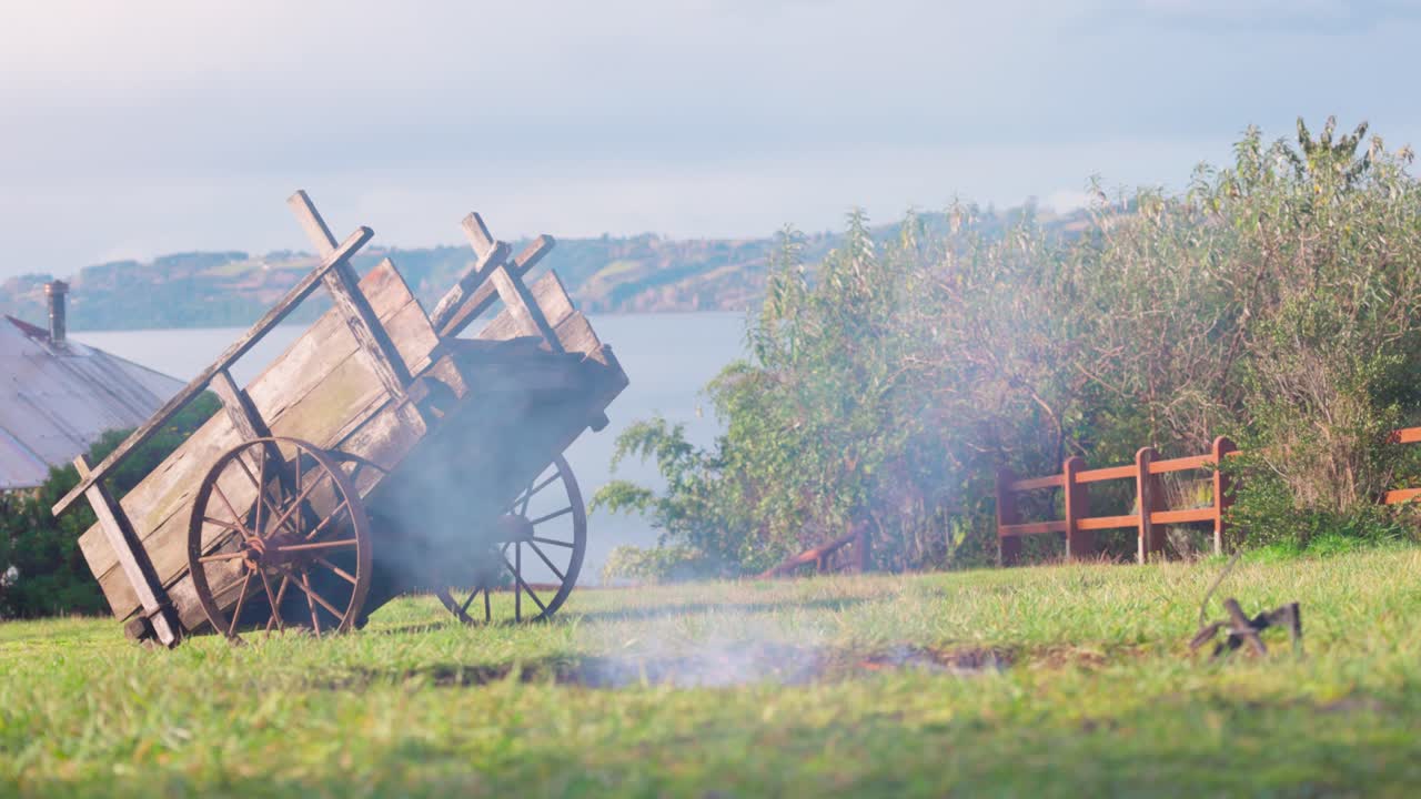 Chilean Fiestas Patrias Lamb to fire, and a cart in Castro, Chilo&eacute; south of Chile
