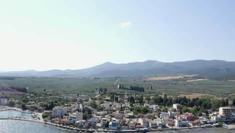 aerial view of agia marina village harbour on greek aegean coast