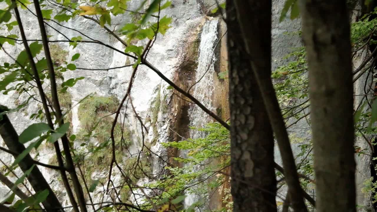 The view above the village of Gozd Martuljek in Slovenia with the beautiful nature and green forest around,