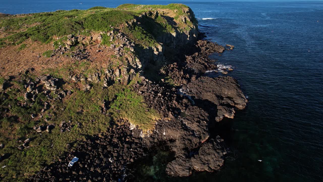 Cook Island With Rocky Coastline In Tasman Sea, NSW, Australia - Drone Shot
