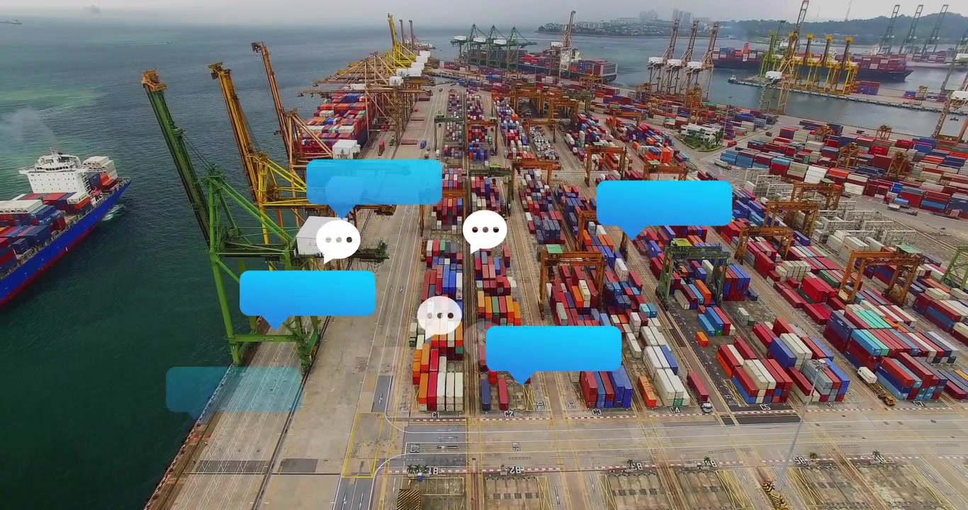 Vista aerea di un deposito container dove inizia ad apparire una bolla blu, generando icone di chat che si raggruppano e poi svaniscono.