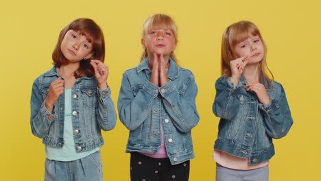 three girls siblings friends praying making wish begging apology forgiveness help
