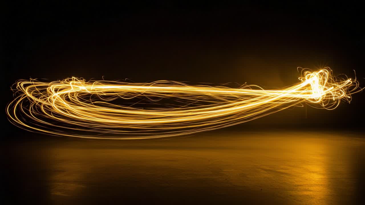 Dynamic Display of Illuminated Motion: Captivating Swirls of Light Against a Dark Background Creating a Mesmerizing Artistic Experience