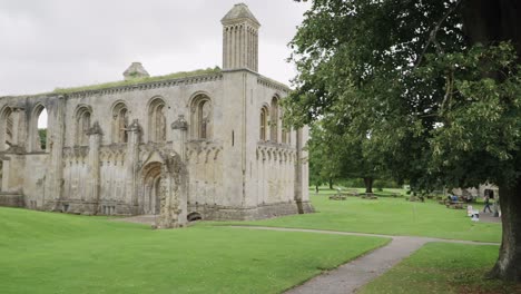 glastonbury abbey ruins main entrance, camera pan right to left 4k slow motion